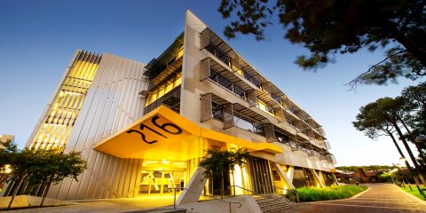 Architecture building on the Curtin Campus, lit up at night